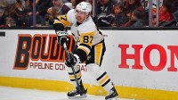 Pittsburgh Penguins center Sidney Crosby (87) passes the puck against the Anaheim Ducks during the first period at Honda Center.