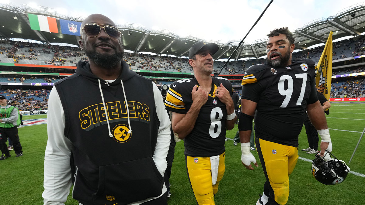 Pittsburgh Steelers coach Mike Tomlin (left), quarterback Aaron Rodgers (center) and defensive tackle Cameron Heyward (97) leave the field after an NFL International Series game against the Minnesota Vikings at Croke Park.