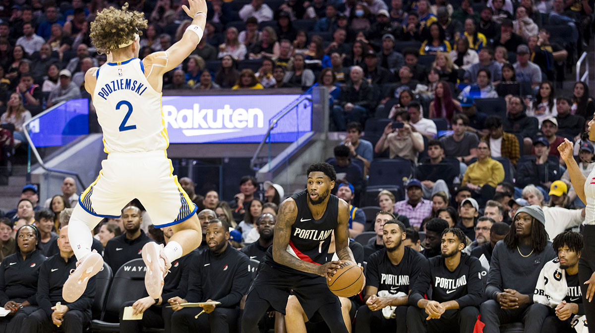 Golden State Warriors guard Brandin Podziemski (2) defends Portland Trail Blazers guard Blake Wesley (1) during the second quarter at Chase Center.
