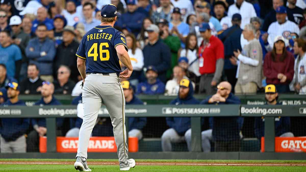 Milwaukee Brewers pitcher Quinn Priester (46) heads to the dugout after being relieved against the Chicago Cubs in the first inning during game three of the NLDS round for the 2025 MLB playoffs at Wrigley Field.