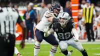 Chicago Bears guard Joe Thuney (62) attempts to stop Las Vegas Raiders defensive end Maxx Crosby (98) during the second half at Allegiant Stadium
