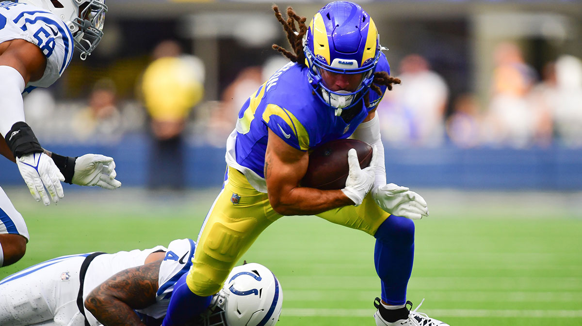 Los Angeles Rams wide receiver Jordan Whittington (88) is brought down by Indianapolis Colts cornerback Xavien Howard (4) during the first half at SoFi Stadium.