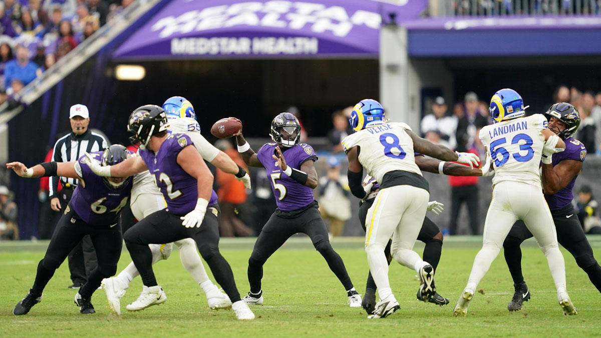 Baltimore Ravens quarterback Tyler Huntley (5) looks to pass the ball against the Los Angeles Rams during the fourth quarter of the game at M&T Bank Stadium.