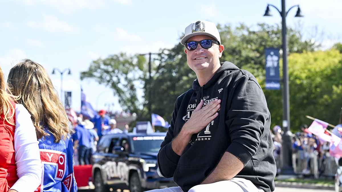 Texas Rangers general manager Chris Young smiles to the fans during the World Series championship parade at Globe Life Field.