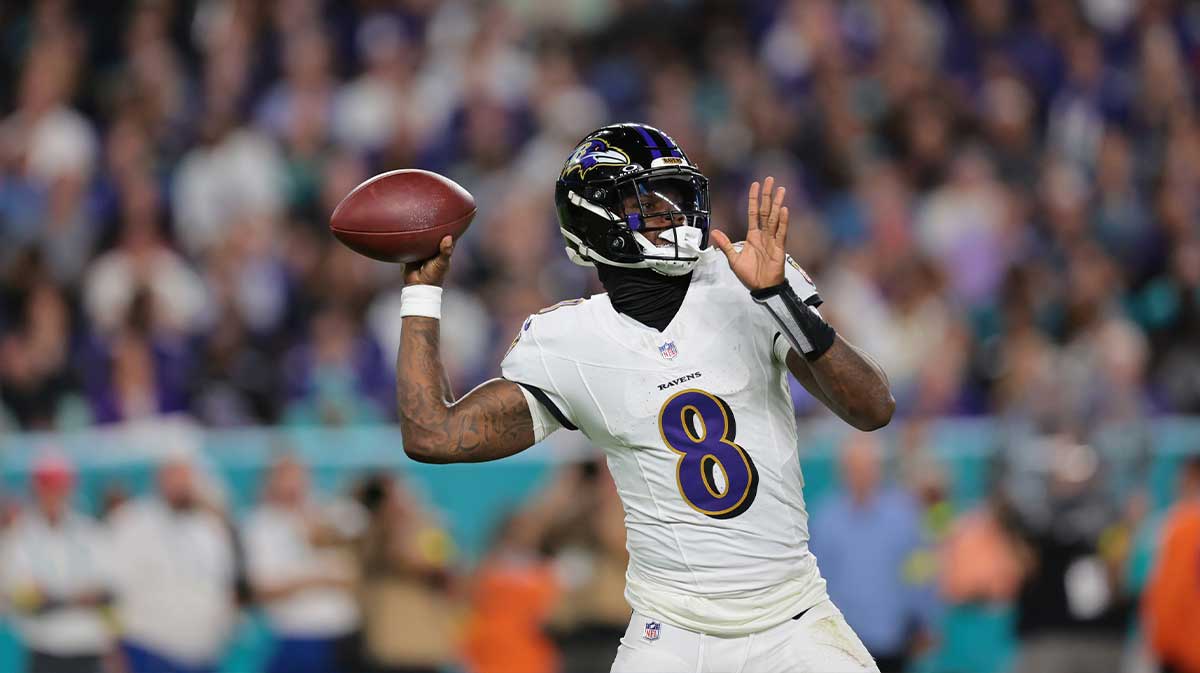 Baltimore Ravens quarterback Lamar Jackson (8) throws downfield during the second quarter against the Miami Dolphins at Hard Rock Stadium.