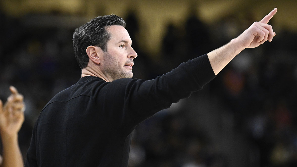 Los Angeles Lakers head coach JJ Redick gestures during the first half against the Phoenix Suns at Acrisure Arena.