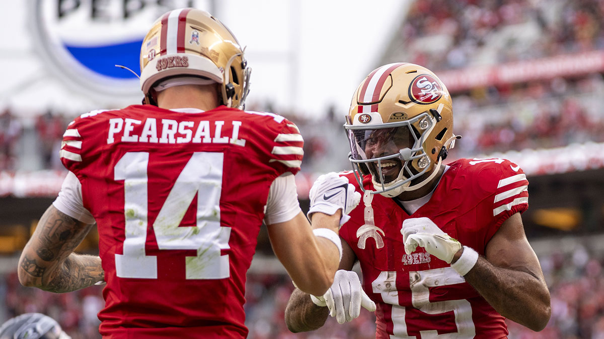 San Francisco 49ers wide receiver Jauan Jennings (15) celebrates with wide receiver Ricky Pearsall (14) against the Seattle Seahawks during the fourth quarter at Levi's Stadium.