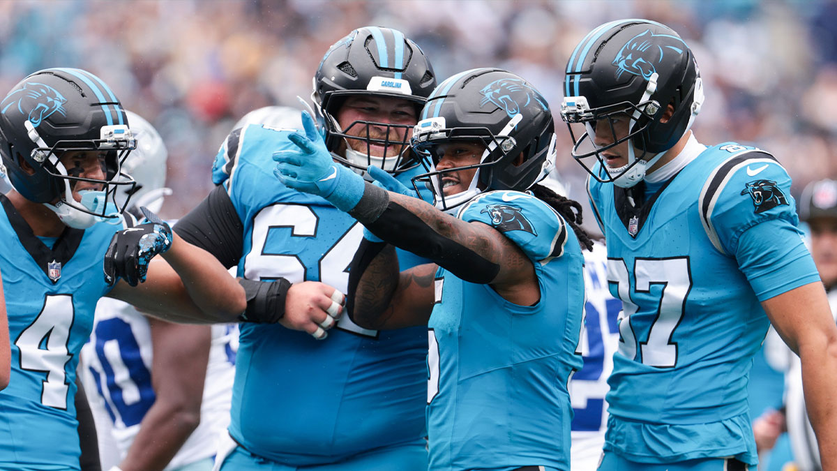 Carolina Panthers running back Rico Dowdle (5) celebrates a first down during the second half against the Dallas Cowboys at Bank of America Stadium.