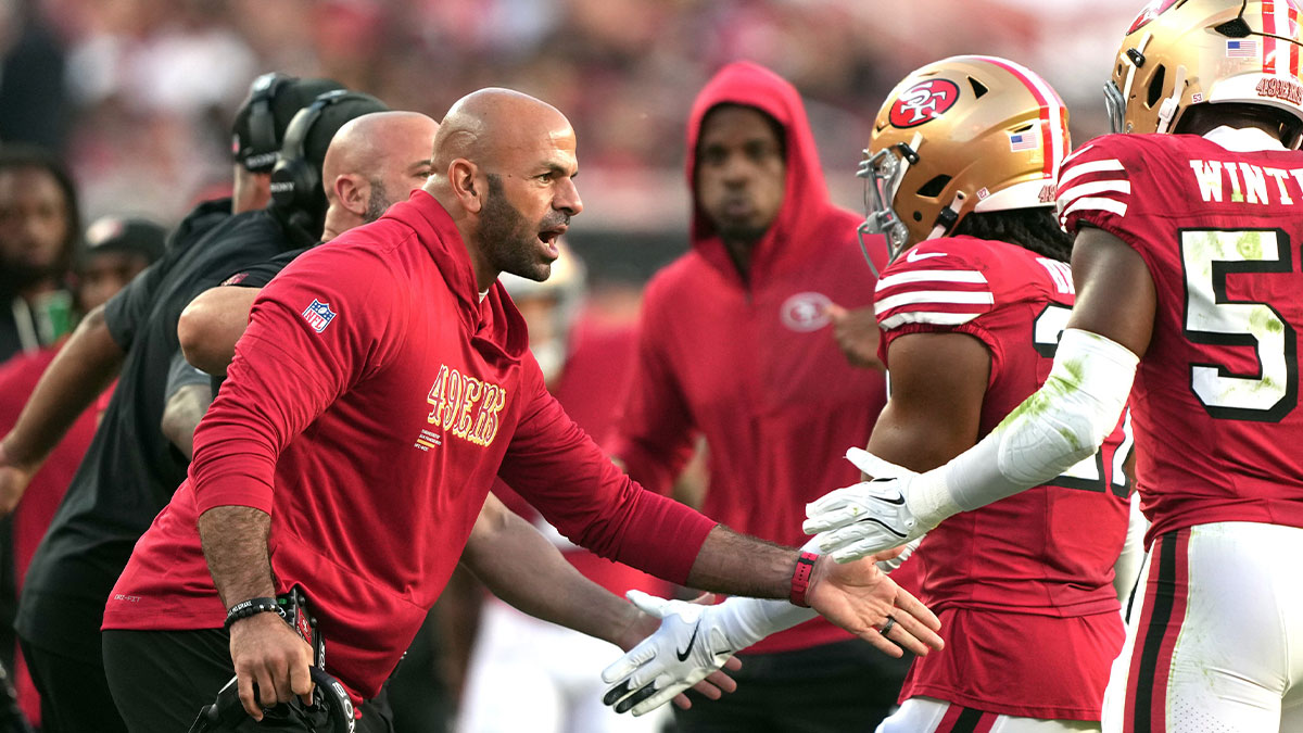 San Francisco 49ers defensive coordinator Robert Saleh (left) congratulates linebacker Dee Winters (right) during the second quarter against the Atlanta Falcons at Levi's Stadium.