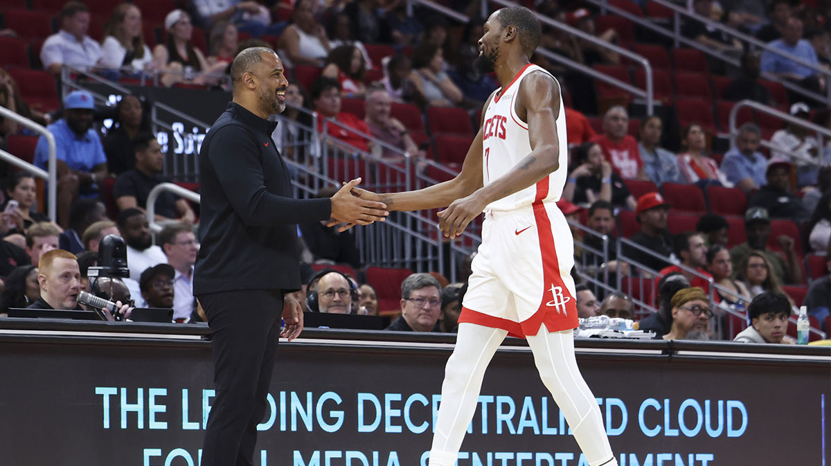 Rockets Head Coach Ime Udoka and forward Kevin Durant (7) react during the third quarter against the Utah Jazz at Toyota Center