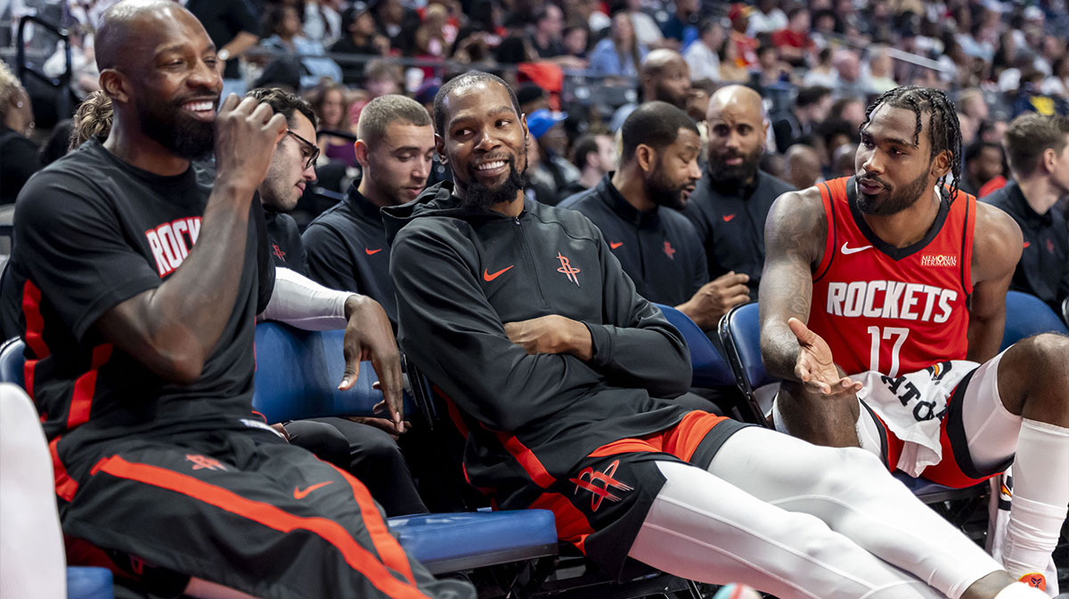 Rockets forward Jeff Green and Houston Rockets forward Kevin Durant (7) and Houston Rockets forward Tari Eason (17) share a moment on the bench during the second half of an NBA preseason game against the New Orleans Pelicans at Legacy Arena at BJCC