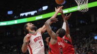 Rockets center Steven Adams rebounds vs. Raptors