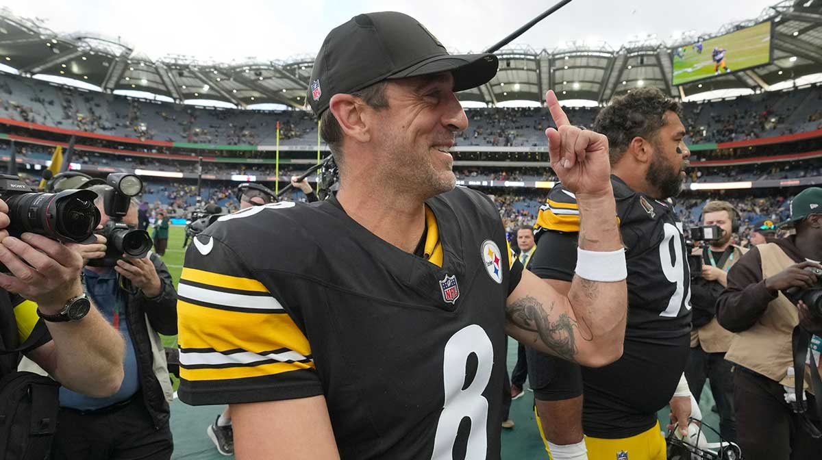 Pittsburgh Steelers quarterback Aaron Rodgers (8) and defensive tackle Cameron Heyward (97) leave the field after an NFL International Series game against the Minnesota Vikings at Croke Park.