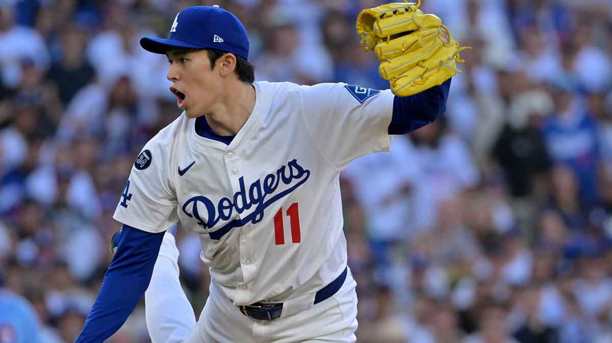 Los Angeles Dodgers pitcher Roki Sasaki (11) throws in the eighth inning against the Philadelphia Phillies during game four of the NLDS round for the 2025 MLB playoffs at Dodger Stadium. Mandatory Credit: Jayne Kamin-Oncea-Imagn Images