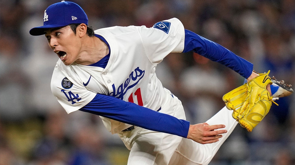 Los Angeles Dodgers pitcher Roki Sasaki (11) throws a pitch in the ninth inning of the MLB National League Wild Card Game 2 between the Los Angeles Dodgers and the Cincinnati Reds at Dodger Stadium in Los Angeles on Wednesday, Oct. 1, 2025. The Reds were eliminated from the postseason with an 8-4 loss to the reining World Series Champions La Dodgers.