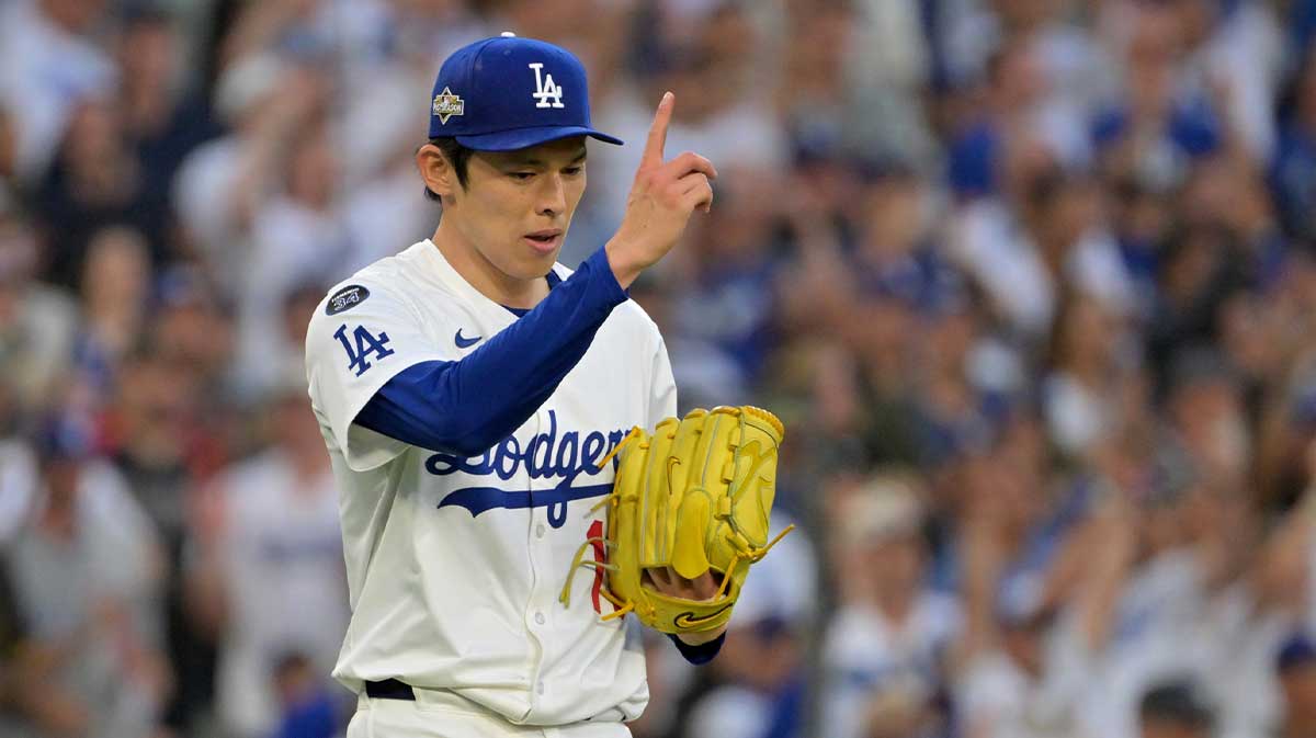 Los Angeles Dodgers pitcher Roki Sasaki (11) reacts after the tenth inning against the Philadelphia Phillies during game four of the NLDS round for the 2025 MLB playoffs at Dodger Stadium.
