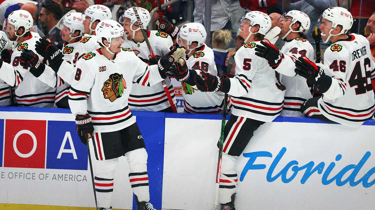 Chicago Blackhawks center Ryan Donato (8) is congratulated after he scored a goal against the Tampa Bay Lightning during the third period at Benchmark International Arena.