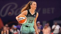 New York Liberty guard Sabrina Ionescu (20) dribbles against the Phoenix Mercury during the first half of game three of round one for the 2025 WNBA Playoffs at PHX Arena.
