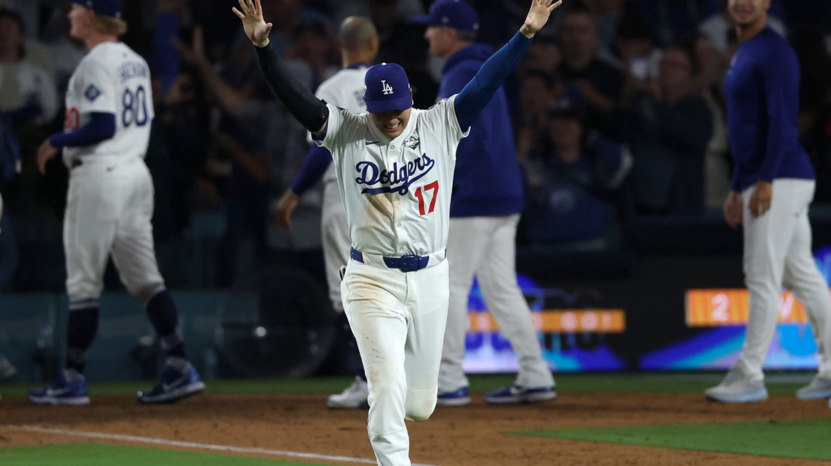 Oct 27, 2025; Los Angeles, California, USA; Los Angeles Dodgers designated hitter Shohei Ohtani (17) celebrates after winning in the eighteenth inning against the Toronto Blue Jays in game three of the 2025 MLB World Series at Dodger Stadium. Mandatory Credit: Kiyoshi Mio-Imagn Images