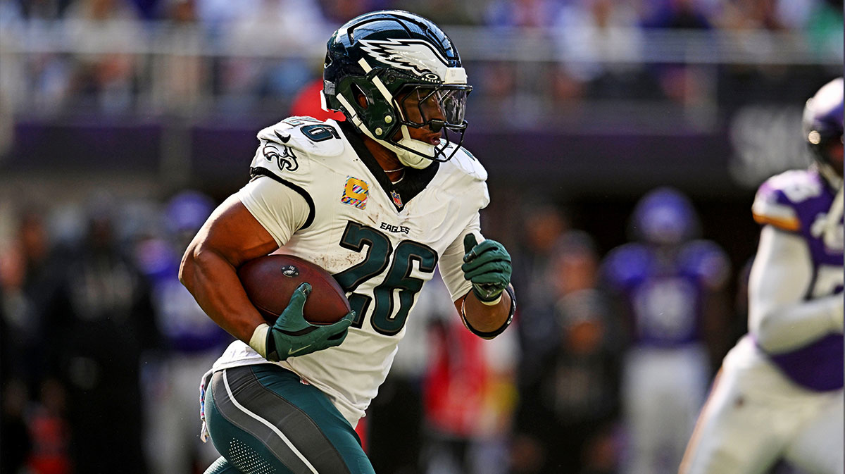 Philadelphia Eagles running back Saquon Barkley (26) runs the ball during the second half against the Minnesota Vikings at U.S. Bank Stadium.