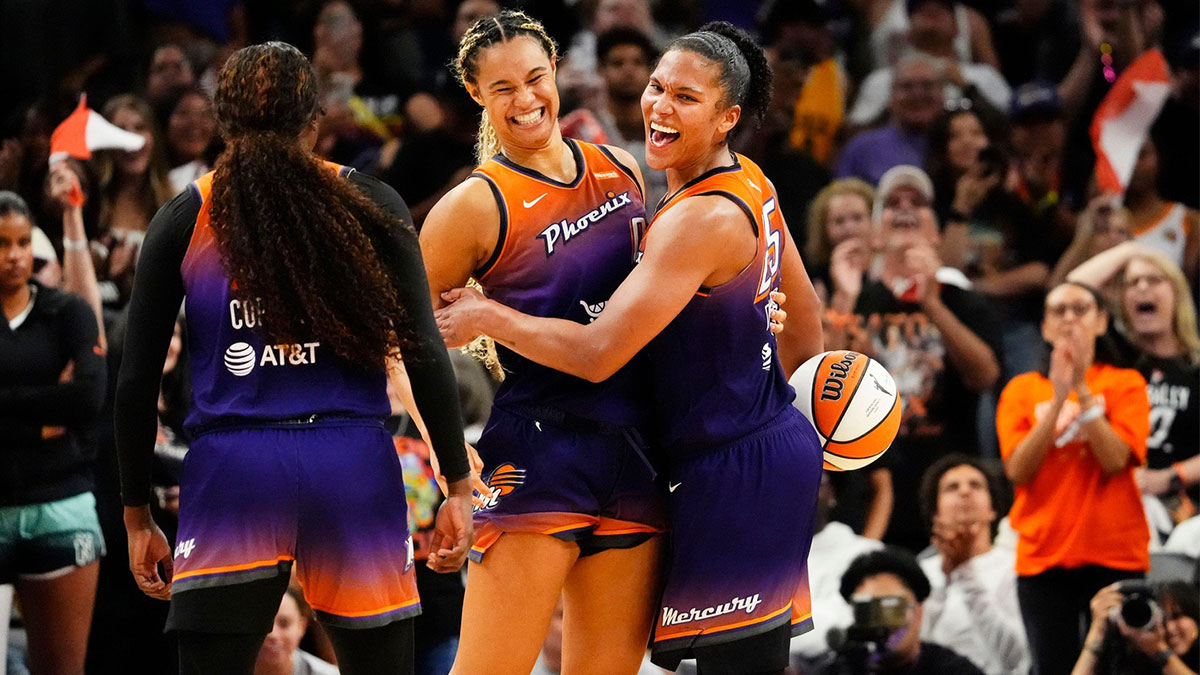 Phoenix Mercury guard Kahleah Copper (2), forward Satou Sabally (0) and forward Alyssa Thomas (25) celebrate their win over the New York Liberty 79-73 to win the series during Game Three of the 2025 WNBA Playoffs first round at PHX Arena on Sept. 19, 2025, in Phoenix.