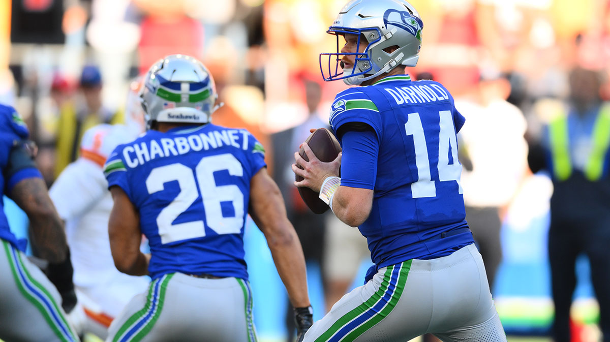 Seattle Seahawks quarterback Sam Darnold (14) stands in the pocket against the Tampa Bay Buccaneers during the second half at Lumen Field.