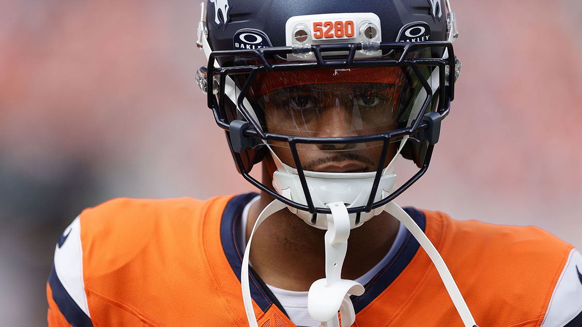 Denver Broncos cornerback Pat Surtain II (2) displays a gold shield logo patch on his uniform in the second half at Empower Field at Mile High.