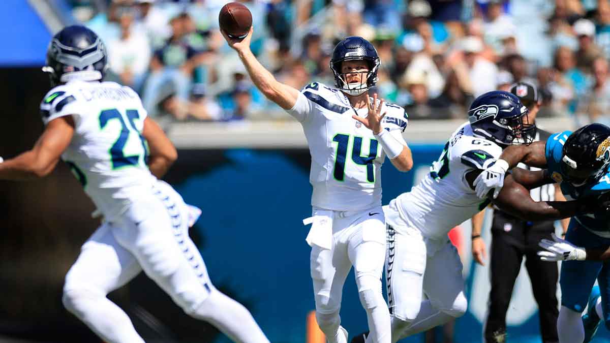 Seattle Seahawks quarterback Sam Darnold (14) throws the ball during the second quarter
