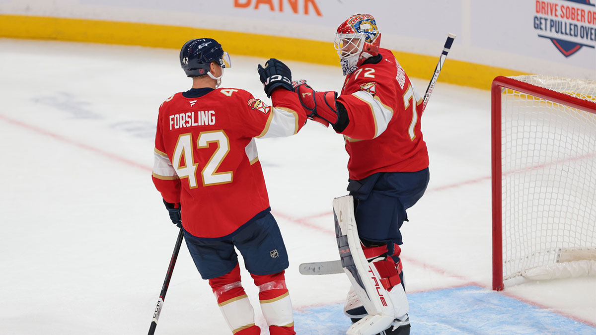 Florida Panthers goaltender Sergei Bobrovsky (72) celebrates with defenseman Gustav Forsling (42) after the game against the Chicago Blackhawks at Amerant Bank Arena.
