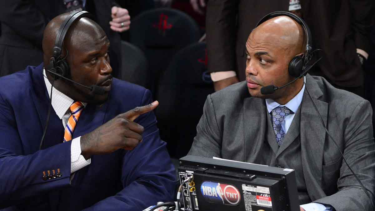 TNT broadcaster Shaquille O'Neal (left) and Charles Barkley talk during the 2013 NBA All-Star slam dunk contest at the Toyota Center.