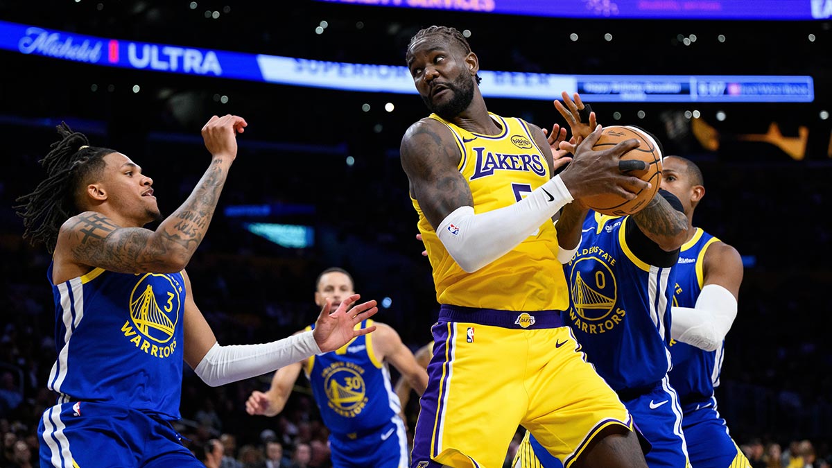 Los Angeles Lakers center Deandre Ayton (5) grabs a rebound against Golden State Warriors guard Gary Payton II (0) during the first half at Crypto.com Arena.