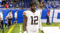 Cleveland Browns quarterback Shedeur Sanders (12) warms up before the game against the Detroit Lions at Ford Field.
