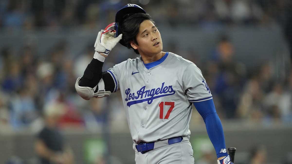Los Angeles Dodgers designated hitter Shohei Ohtani (17) walks to the dugout after striking out against the Toronto Blue Jays during the sixth inning at Rogers Centre.