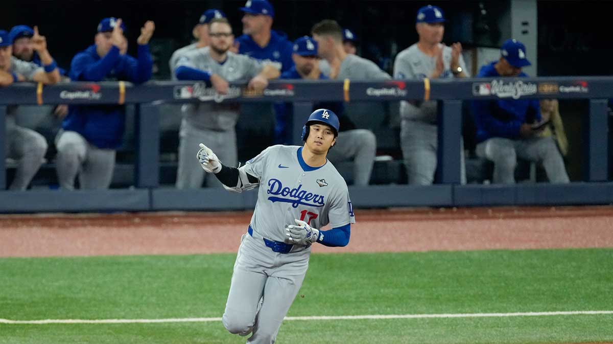 os Angeles Dodgers designated hitter Shohei Ohtani (17) rounds the bases after hitting a two-run home run against the Toronto Blue Jays in the seventh inning during game one of the 2025 MLB World Series at Rogers Centre.