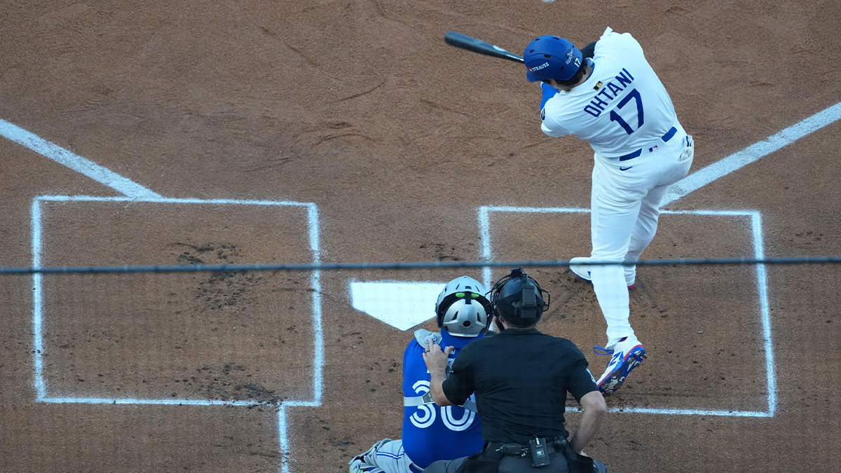 Los Angeles Dodgers designated hitter Shohei Ohtani (17) doubles during the first inning against the Toronto Blue Jays in game three of the 2025 MLB World Series at Dodger Stadium.