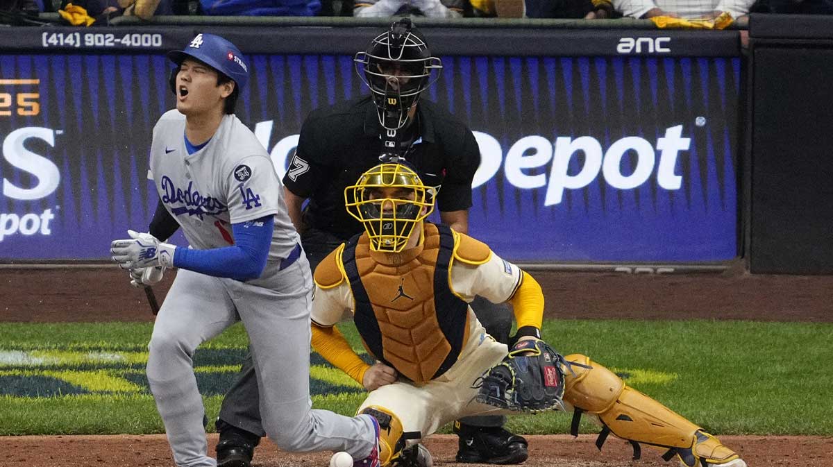 Los Angeles Dodgers two-way player Shohei Ohtani (17) fouls a ball off his leg in the seventh inning during game two of the NLCS round for the 2025 MLB playoffs at American Family Field.