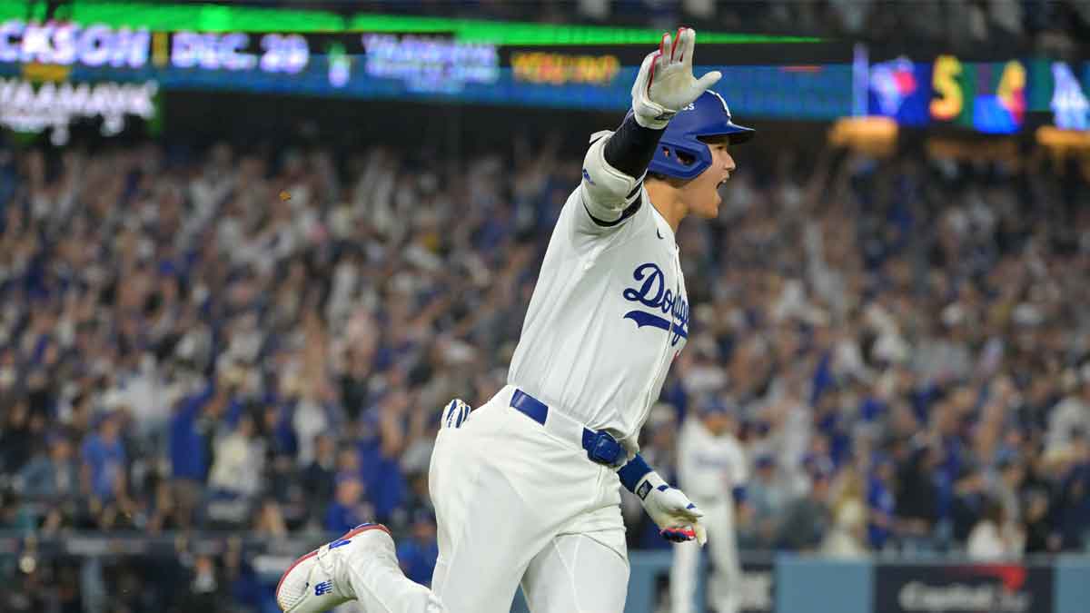 Los Angeles Dodgers two-way player Shohei Ohtani (17) runs after hitting a solo home run against the Toronto Blue Jays in the seventh inning during game three of the 2025 MLB World Series at Dodger Stadium.
