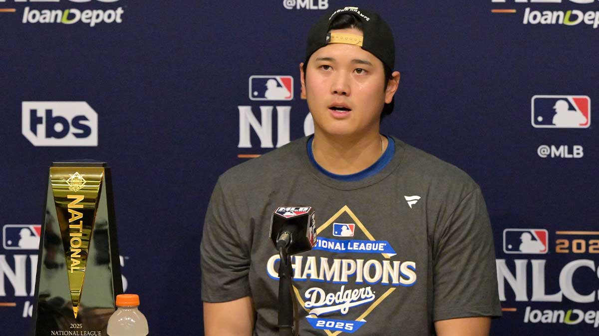 Los Angeles Dodgers two-way player Shohei Ohtani (17) speaks at a press conference after defeating the Milwaukee Brewers in game four of the NLCS round for the 2025 MLB playoffs at Dodger Stadium.