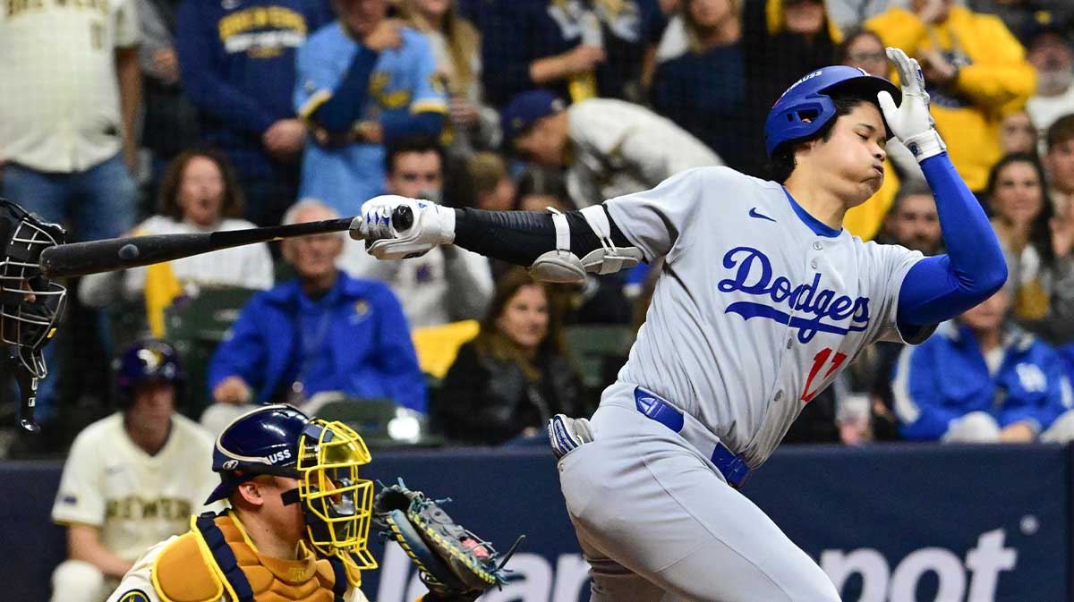 Los Angeles Dodgers designated hitter Shohei Ohtani (17) strikes out against the Milwaukee Brewers in the eighth inning during game two of the NLCS round for the 2025 MLB playoffs at American Family Field.