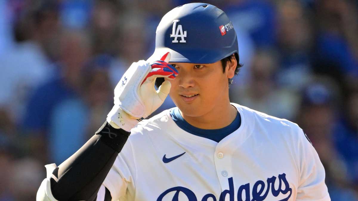 Los Angeles Dodgers two-way player Shohei Ohtani (17) looks on at bat against the Milwaukee Brewers in the second inning during game three of the NLCS round for the 2025 MLB playoffs at Dodger Stadium.
