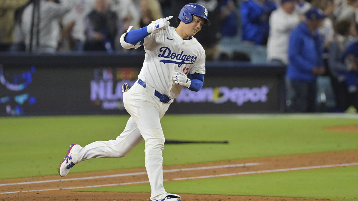 Los Angeles Dodgers two-way player Shohei Ohtani (17) reacts to his solo home run against the Milwaukee Brewers during the seventh inning of game four of the NLCS round for the 2025 MLB playoffs at Dodger Stadium.