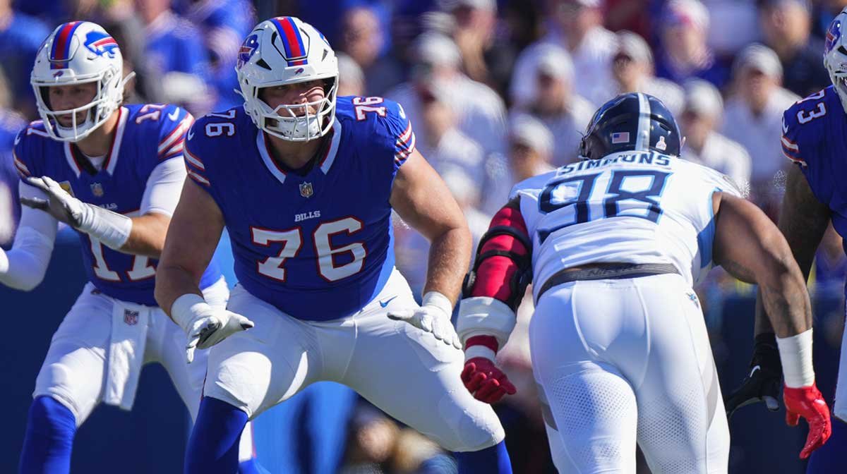 Buffalo Bills guard David Edwards (76) looks to block Tennessee Titans defensive tackle Jeffrey Simmons (98) during the first half at Highmark Stadium