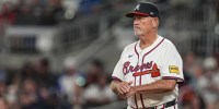 Atlanta Braves manager Brian Snitker (43) on the field against the Chicago Cubs during the eighth inning at Truist Park.