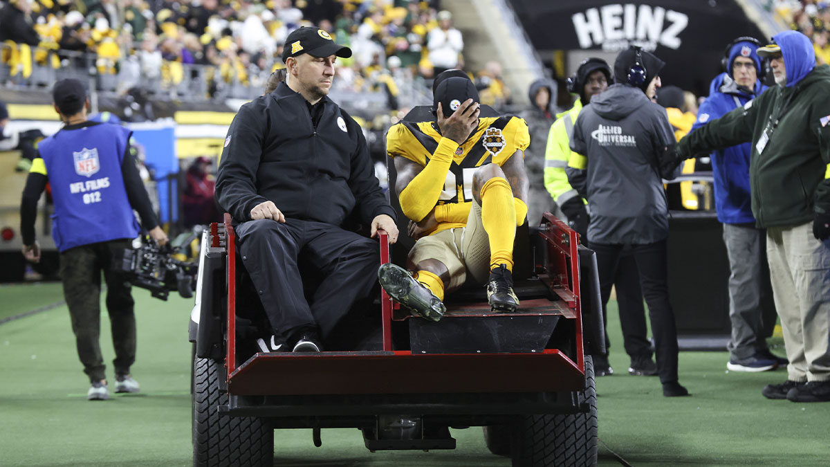 Pittsburgh Steelers safety DeShon Elliott (25) is carted off after a third quarter injury against the Green Bay Packers at Acrisure Stadium.