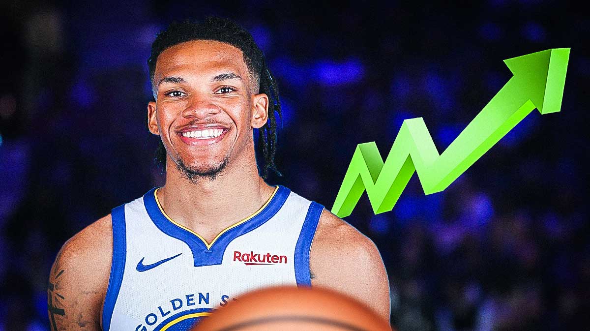 Warriors Will Richard smiling with a big stocks up emoji next to him