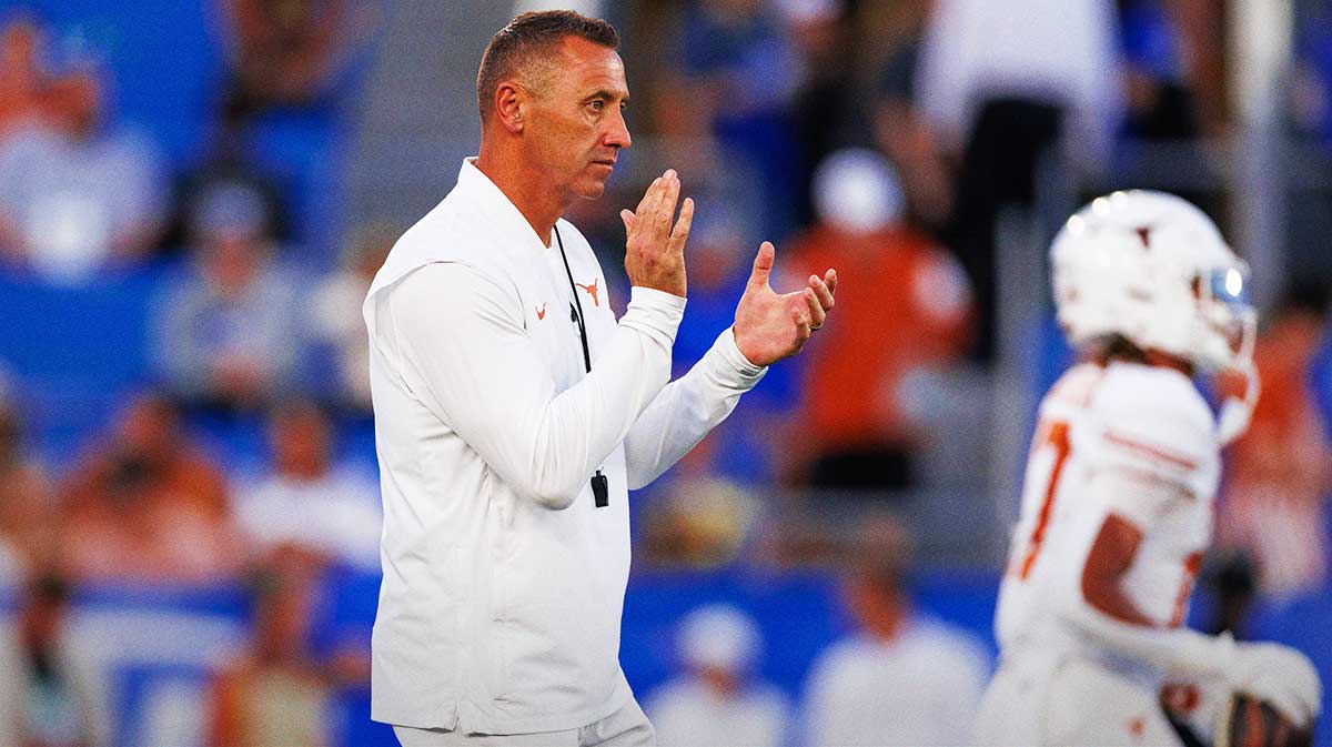 Texas Longhorns head coach Steve Sarkisian claps during warmups before the game against the Kentucky Wildcats at Kroger Field.