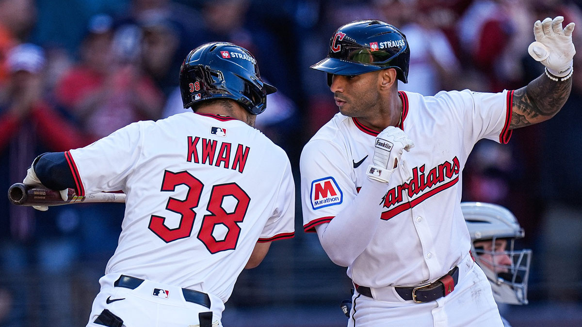 Cleveland Guardians second base Brayan Rocchio (4), right, celebrates with left fielder Steven Kwan (38) after batting a solo home run against Detroit Tigers during the eighth inning of Game 2 of AL wild-card series at Progressive Field in Cleveland, Ohio on Wednesday, Oct. 1, 2025.