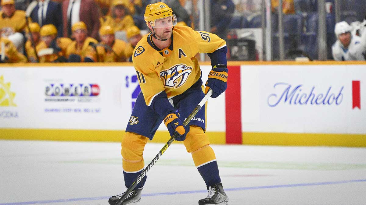 Nashville Predators center Steven Stamkos (91) skates with the puck against the Utah Mammoth during the third period at Bridgestone Arena.