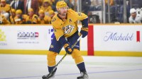Nashville Predators center Steven Stamkos (91) skates with the puck against the Utah Mammoth during the third period at Bridgestone Arena.