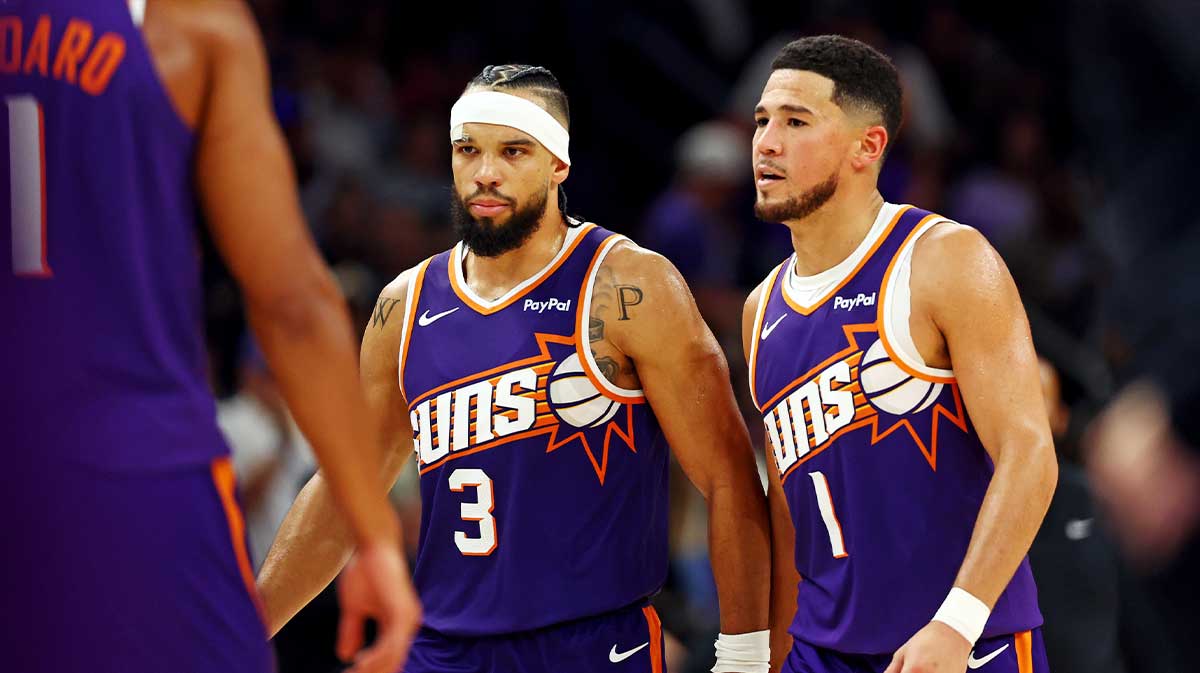 Suns guard Devin Booker (1) and forward Dillon Brooks (3) during the second half against the Sacramento Kings at the Mortgage Matchup Center
